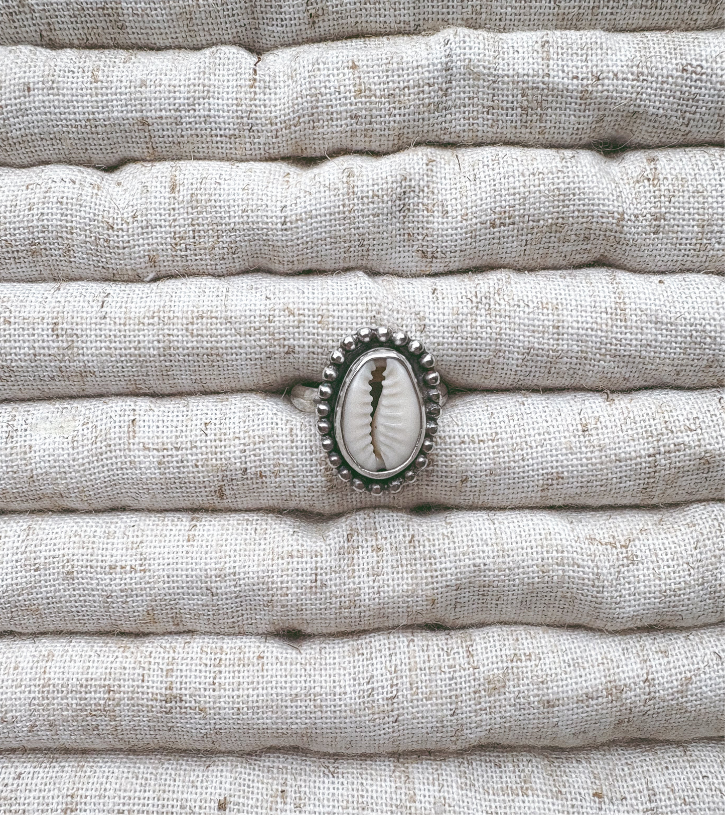 Beaded cowrie ring
