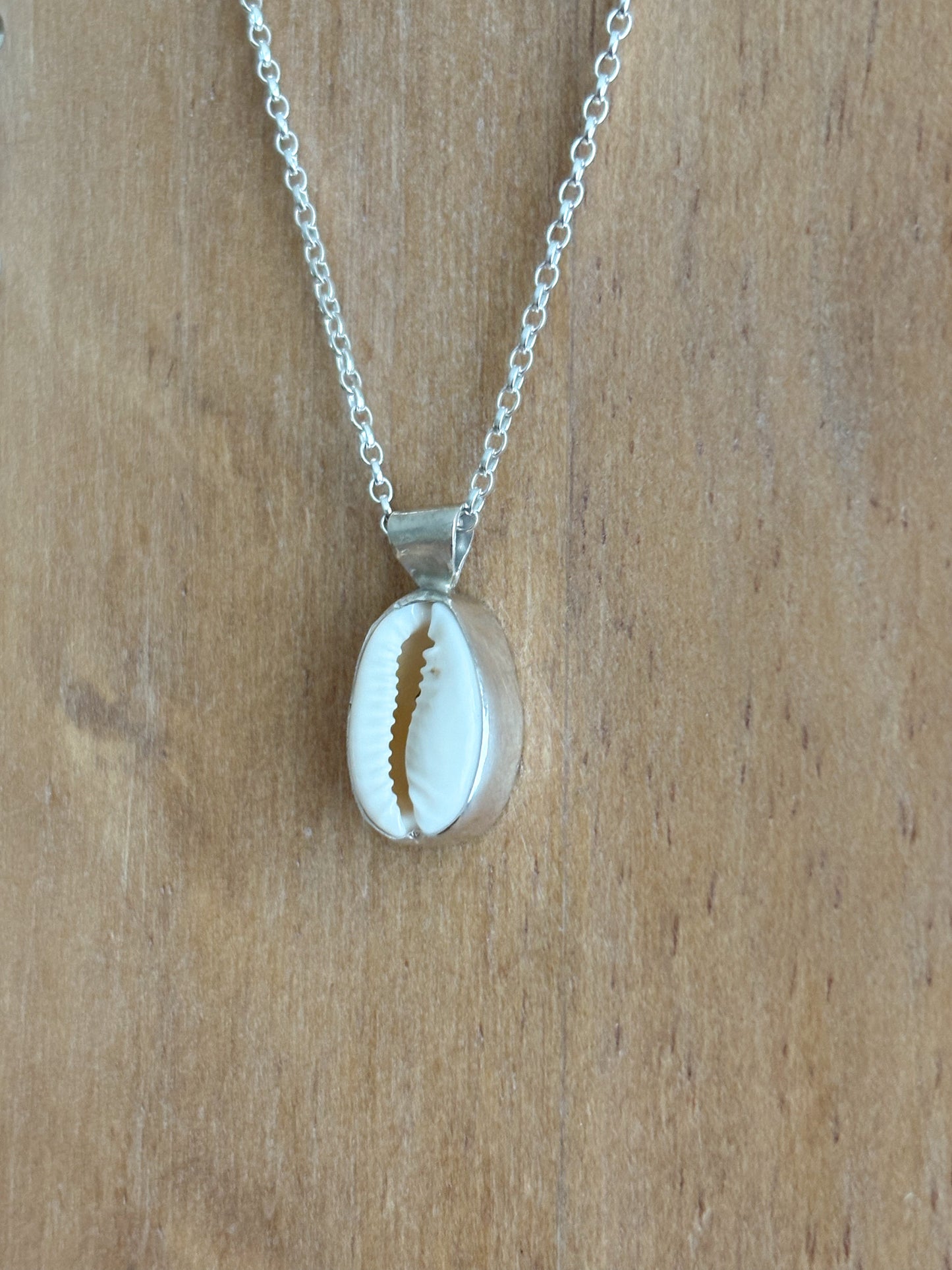 Cowrie shell pendant