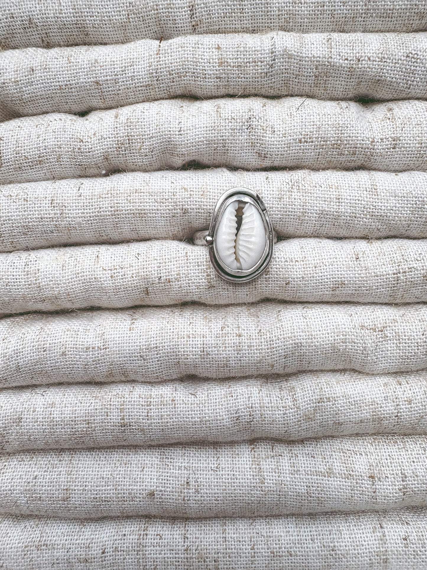 Cowrie ring with detailing
